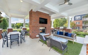 Summerhouse with fireplace, tv, and grills